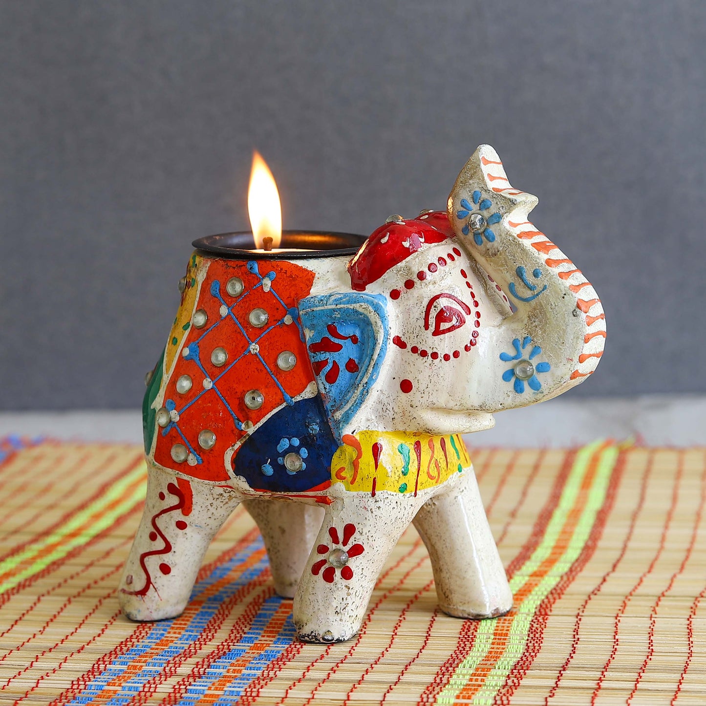 Hand-painted wooden candle elephant sculpture