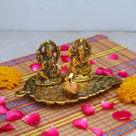 Ganesh Laxmi Sitting on Peepal Diya Lamp