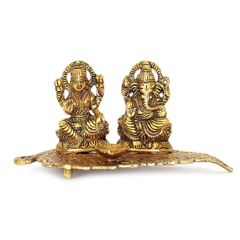 Ganesh Laxmi Sitting on Peepal Diya Lamp