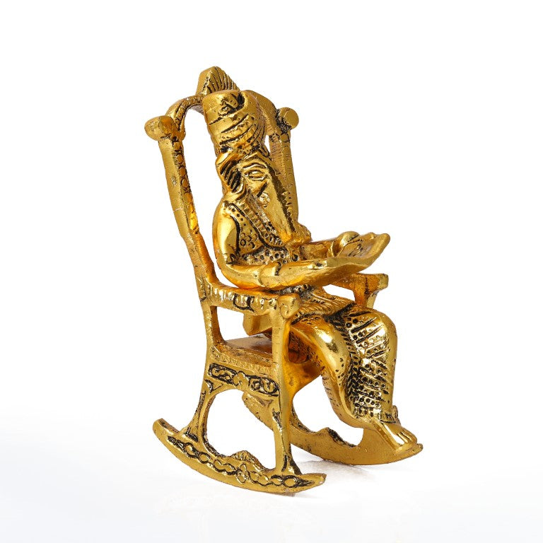 Lord Ganesha Idol Reading Book on Rocking Chair